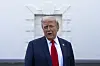 U.S. President Donald Trump speaks with reporters at the White House in Washington on April 23. [AP/YONHAP]