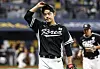 Moon Dong-ju heads to the dugout at the end of the first inning of a game between Korea and the San Diego Padres at Gocheok Sky Dome in western Seoul on Sunday. [YONHAP]