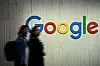 People walk next to a Google logo during a trade fair in Hannover Messe, in Hanover, Germany, April 22, 2024. [REUTERS/YONHAP]