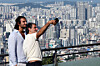 Tourists takes photos on Mount Namsan in central Seoul on Aug. 21. [YONHAP]