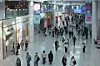 Travelers walk and shop inside the duty-free area of Terminal 1 at Incheon International Airport on Nov. 6. [YONHAP]