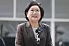 Lee Hye-hoon, the nominee for the new minister for planning and budget, talks to reporters while heading to her office to prepare for her parliamentary confirmation hearing in central Seoul on Dec. 29, 2025. [YONHAP]