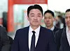 Presidential chief of staff Kang Hoon-sik arrives at the Incheon Internation Airport to leave for Germany as the Presidential Economic Cooperation Envoy, on Oct. 19, 2025. [NEWS1]