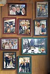 Photos of Min and his regulars hung up on a wall at French restaurant Chez Laurent [PARK SANG-MOON]