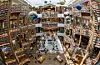 People relax at the Byeolmadang Library at Starfield Suwon in Jangan District, Suwon, on the afternoon of Aug. 10, 2025. The Suwon Byeolmadang Library is the second of its kind to open, following the original Byeolmadang Library at COEX Mall in Seoul. [KIM JUNG-HOON]