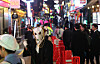 People wearing costumes roam the streets of Itaewon in central Seoul on Halloween, or Oct. 31. [YONHAP]