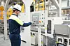 An employee at Posco Future M's Technology Research Center in Sejong is seen operating pilot equipment for the test production of cathode materials, in this file photo provided by the company [POSCO FUTURE M]
