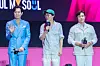 Actors Lee Jung-jae and Lee Byung-hun and director Hwang Dong-hyuk during a fan event for the release of the third season of “Squid Game” (2021-) at Seoul Plaza in central Seoul on June 28. [DANIELA GONZALEZ PEREZ]