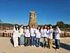 International student volunteers preparing to serve during the APEC summit pose for a group photo in front of Cheomseongdae Observatory in Gyeongju, North Gyeongsang, on Oct. 27. [KIM JUNG-SEOK]