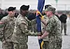 Incoming commander Gen. Xavier Brunson, center left, receives the United States Forces Korea flag from U.S. Navy Adm. Samuel John Paparo, commander of the United States Indo-Pacific Command, during a change-of-command ceremony for the United Nations Command, Combined Forces Command, and the United States Forces Korea at Camp Humphreys in Pyeongtaek on Dec. 20, 2024. [AP/YONHAP]