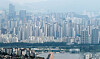 Apartment complexes are seen from Mount Namsan in central Seoul on July 6. [NEWS1]