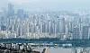 Apartment complexes are seen from Mount Namsan in central Seoul on July 6. [NEWS1]