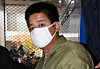 Lee Young-hak stares at a camera while entering the Seoul Northern District Court for the first trial on his murder of a 14-year-old girl on Nov. 17, 2017. [NEWS1]