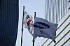 A flag bearing the logo of Samsung Electronics flutters at the company's office building in southern Seoul on April 15. [REUTERS/YONHAP]