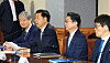 Finance Minister Koo Yun-cheol, second from left, speaks during a meeting of senior economic policymakers in Seoul on Sept. 18. [YONHAP]