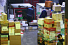 Workers sort parcels at the East Seoul Postal Logistics Center in Gwangjin District, eastern Seoul, on Jan. 21. [YONHAP]