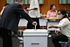 A voter in Busan casts his ballot on June 3, the day of Korea's 21st presidential election. [NEWS1]
