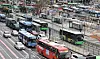 Buses pass near Seoul Station in downtown Seoul on Tuesday. [YONHAP]