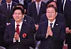 Democratic Party's presidential candidate Lee Jae-myung, left, and People Power Party candidate Kim Moon-soo attend a celebratory Buddhist ceremony in front of the Daeungjeon Hall at Jogye Temple in Jongno District, central Seoul, on May 5, Buddha’s Birthday in the year 2569 of the Buddhist calendar. [JOINT PRESS CORPS]