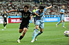 Team K League's Yun Do-yong, left, vies for the ball with Tottenham Hotspur captain Son Heung-min during a Coupang Play Series match at the Seoul World Cup Stadium in western Seoul on July 31, 2024. [YONHAP]