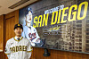 Song Sung-mun poses for a photo wearing a San Diego Padres shirt in this photo provided by the Kiwoom Heroes. The Major Leage Baseball team announced it signed a four-year contract with Song on Dec. 22. [KIWOOM HEROES]