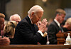 Former U.S. President Joe Biden kneels in prayer during funeral services for Mark and Melissa Hortman at the Basilica of St. Mary in Minneapolis, Minnesota, on June 28. [REUTERS/YONHAP]