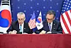 South Korean Foreign Minister Cho Tae-yul, right, and then-U.S. Ambassador to Korea Philip Goldberg sign the 12th Special Measures Agreement at the Ministry of Foreign Affairs in central Seoul on Nov. 4, 2024. [MINISTRY OF FOREIGN AFFAIRS]