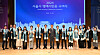 First Vice Mayor of Seoul Kim Sang-han, center, and honorary citizenship recipients pose for a photo during the ceremony at the City Hall in central Seoul on Friday. [SEOUL METROPOLITAN GOVERNMENT]