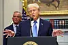 U.S. President Donald Trump, in front of U.S. Secretary of Health and Human Services Robert F. Kennedy Jr., delivers remarks linking autism to childhood vaccines and to the use of popular pain medication Tylenol for pregnant women and children, claims which are not backed by decades of science, at the White House in Washington on Sept. 22. [REUTERS/YONHAP]
