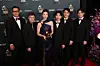 The team from ″KPop Demon Hunters″ (2025) poses in the press room with the award for Best Song Written For Visual media for ″Golden″ (2025) during the 68th annual Grammy Awards ceremony at Crypto.com Arena in Los Angeles on Feb. 1. [EPA/YONHAP]
