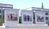 This image captured on June 23, 2025, from the Korean Central Television, shows murals of North Korean founder Kim Il Sung, current leader Kim Jong-un and former leader Kim Jong-il, installed outside the Kim Jong Suk Textile Mill in Pyongyang. [YONHAP]