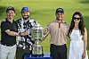 Xander Schauffele and his family members, from left, uncle Gao-Ya Chen, brother Nico Schauffele and wife Maya Schauffele smile with the Wanamaker Trophy after his one-stroke victory in the final round of the PGA Championship at Valhalla Golf Club on May 19 in Louisville, Kentucky. [GETTY IMAGES]