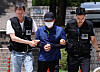 Li, accused of murdering a sanitation worker in his 60s at the Sungnyemun underpass, appears for a pretrial detention hearing at the Seoul Central District Court in Seocho District, Seoul, on Aug. 4, 2024. [NEWS1]