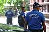 Cambodian police officials are seen at a temple in Phnom Penh on Oct. 20, where an autopsy of a Korean student allegedly tortured to death in the country was scheduled to take place. [YONHAP]