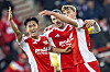 Union Berlin midfielder Jeong Woo-yeong, left, celebrates during a Bundesliga match against Bayer 04 Leverkusen at Stadion An der Alten Forsterei in Berlin, Germany on Saturday. [AP/YONHAP]