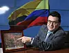 Pointing to a photo taken during the war by Colombian veteran Sergeant Major Gilberto Diaz Velasco, Ambassador of Colombia to Korea Juan Carlos Caiza speaks with the Korea JoongAng Daily on June 29 at the Embassy of Colombia in central Seoul. [PARK SANG-MOON]