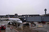 An American Eagle plane sits at a gate, as the FAA Air Traffic Control tower can be seen, at Chicago O'Hare International Airport in Chicago, Ill., Nov. 9. [AP/YONHAP]