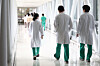 Medical professionals walk inside a general hospital in downtown Seoul on Sept. 30, 2025, a day when junior doctors returned to their posts after mass resignations and a strike. [YONHAP]