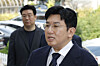 HYBE Chairman Bang Si-hyuk appears at the Financial Crimes Investigation Division of the Seoul Metropolitan Police Agency in western Seoul on Sept. 15. [NEWS1]