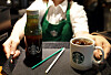 Starbucks drinks with both a plastic straw, left, and paper straw [YONHAP]