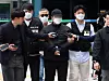 A 33-year-old man who is accused of fatally stabbing a woman at a grocery store in the Mia-dong neighborhood of Gangbuk District, northern Seoul, appears at a pretrial hearing at the Seoul Northern District Court in northern Seoul on April 24. [NEWS1]