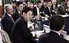 President Lee Jae Myung, center, speak during a roundtable with foreign-invested companies at the Blue House in central Seoul on Jan. 28. [JOINT PRESS CORPS]