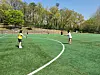 Mary places the ball in the basket after picking it up from the ground. [MARY YANG]