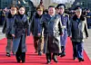 North Korean leader Kim Jong-un, center, and his daughter Ju-ae, to his left, attend a ceremony marking the 80th anniversary of the establishment of the Air Force of the Korean People's Army at the Kalma Airport of the 59th Kil Yong Jo Hero Regiment of the 2nd Air Division on Nov. 28. [KCNA]