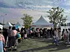 Fans line up at an ″EDM Giving Project″ booth at a concert to make donations in this undated photo provided by JYP Entertainment. [JYP ENTERTAINMENT]