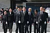 President Lee Jae-myung, center, and first lady Kim Hye-kyung, second to left, walk after paying their respects at the Memorial Tower at Seoul National Cemetery in Dongjak District, southern Seoul, alongside the Democratic Party’s campaign leadership on June 4. [JOINT PRESS CORPS]
