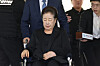 Han Hak-ja, leader of the Unification Church, appears at the Seoul Central District Court in southern Seoul on Sept. 22, 2025, to attend a hearing on the legality of her arrest over charges of bribery linked to former first lady Kim Keon Hee. [YONHAP]