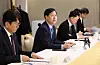 Finance Minister Koo Yun-cheol, center, speaks at a fiscal execution review meeting held at the government complex in central Seoul on Dec. 8. [YONHAP]
