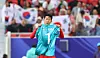 Son Heung-min pays tribute to Kim Seung-gyu after scoring a goal during a game against Jordan at the 2023 AFC Asian Cup on Jan. 21, 2024. [YONHAP]