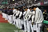 The Doosan Bears stand for a moment of silence ahead of a game against the Kiwoom Heroes at Jamsil Baseball Stadium in southern Seoul on Wednesday. [YONHAP]